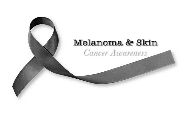 Melanoma and skin cancer, black awareness ribbon (isolated on white background, clipping path)