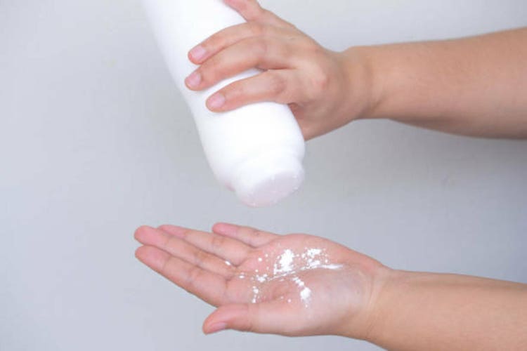 Poured talcum powder on the hand