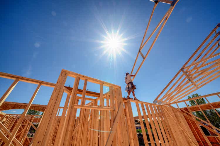 Drone View of a Home being Framed by Carpenters