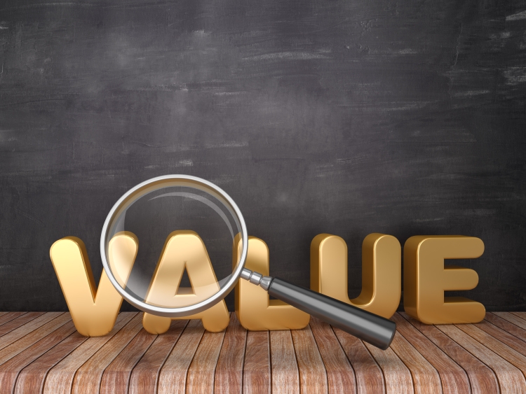 Magnifying Glass with VALUE Word on Chalkboard Background - 3D Rendering