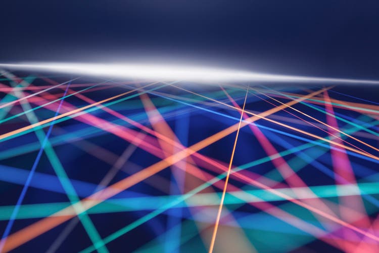 crossing rainbow color strings