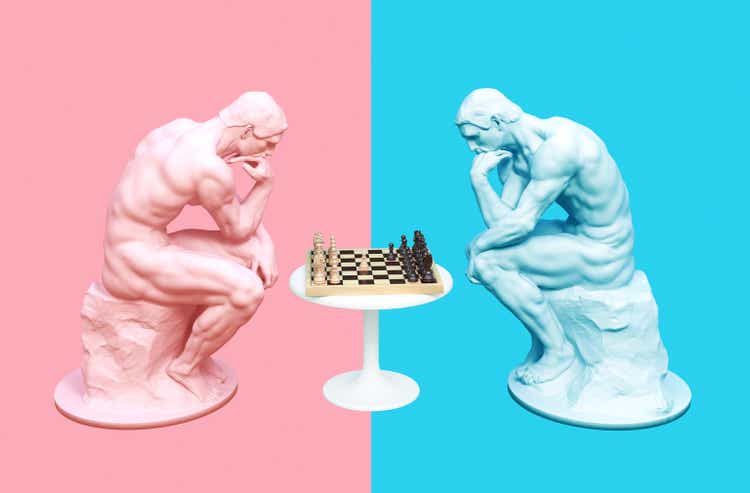 Two Thinkers Pondering The Chess Game On Pink And Blue Backgrounds