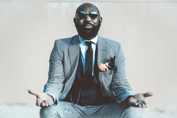 African man with red and blue pills