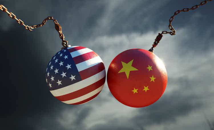 Wrecking Balls Textured with American and Chinese Flags Over Dark Stormy Sky