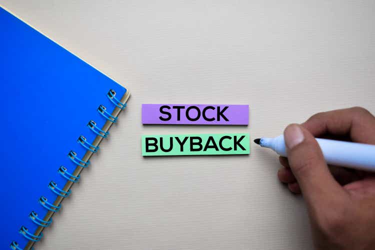 Stock Buyback text on sticky notes with office desk. Stock Market Exchange Concept