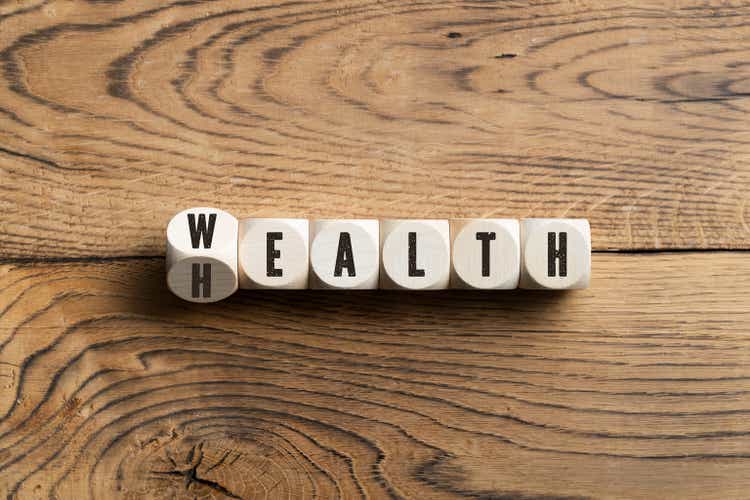 Letters on blocks spelling wealth or health