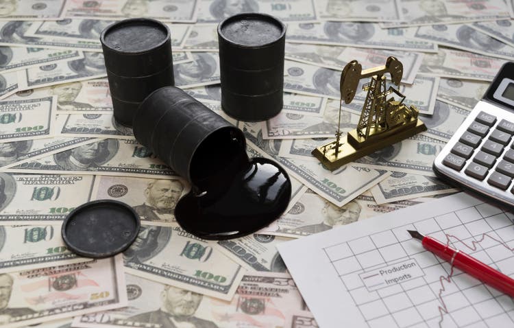 barrels of oil, neftechka, calculator, a schedule of oil production against the background of dollar bills.