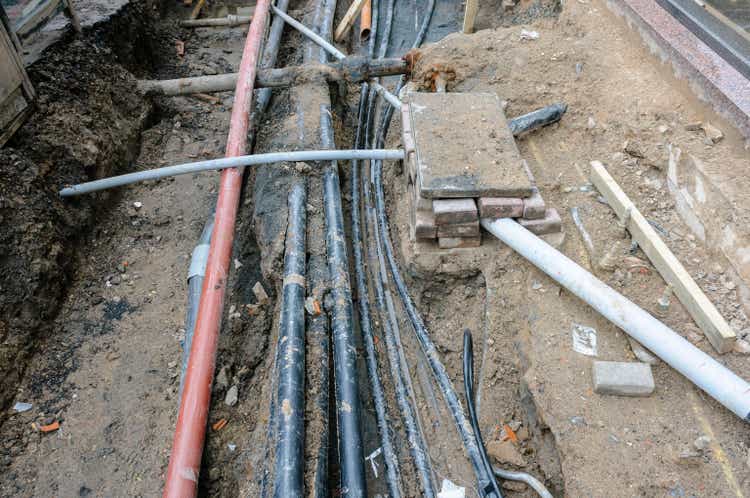 Exposed electrical, gas and telecommunications cables, and water pipes during road and footpath works.