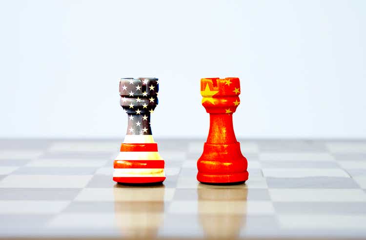 USA flag and China flag print screen on chess with white background.It is symbol of tariff trade war tax barrier between United States of America and China.-Image.