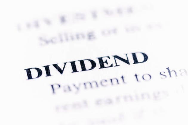 Business dictionary heading defining the word "Dividend"