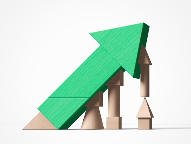 Conceptual still life with rising arrow and risk