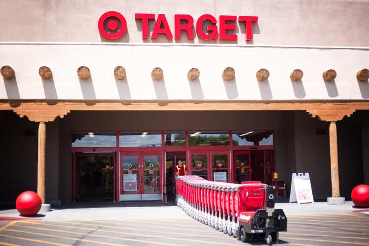 Santa Fe, NM: Target Employee Pulls Red Shopping Carts into Store