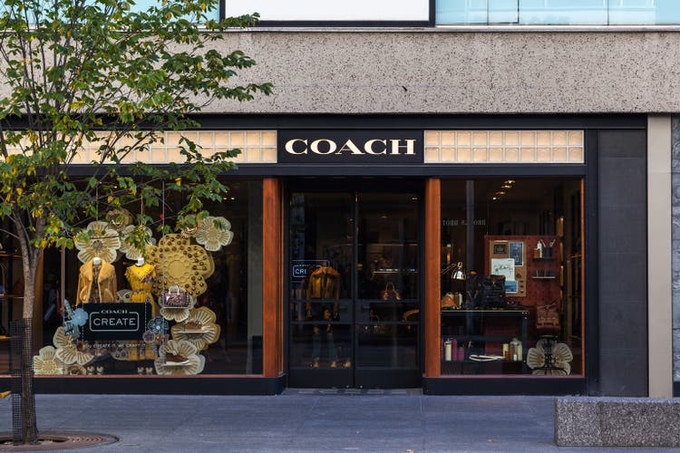 Store sign- Coach. Coach Announces Name Change to Tapestry Inc, the company is known for accessories and gifts for women and men.