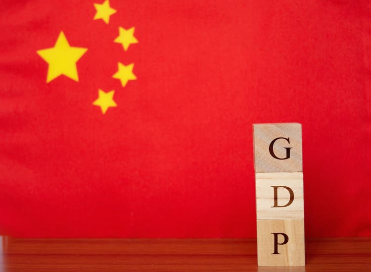 Concept of Gross Domestic Product or GDP of China in wooden letter boxes.