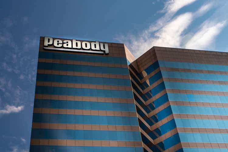 Peabody Energy coal mining corporate logo hangs on side of skyscraper in midwest city