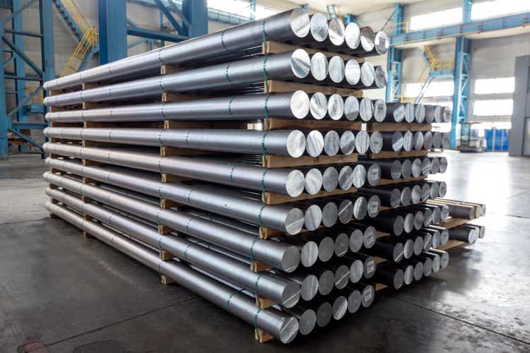 Aluminum billets in the factory. The Hall - Héroult process produces aluminum with purity greater than 99%. Additional purification can be carried out by the hoop process.