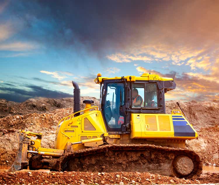 Bulldozer at the construction site in the evening