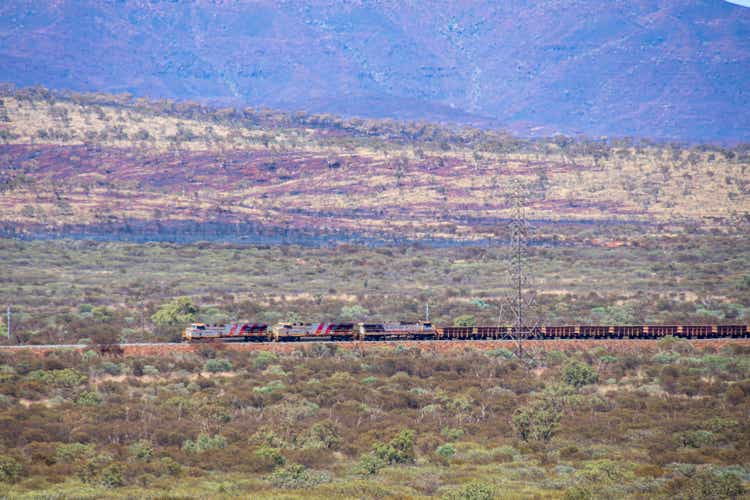 Long train at Karijini National Park transporting iron ore from Marandoo Mine Site towards coast