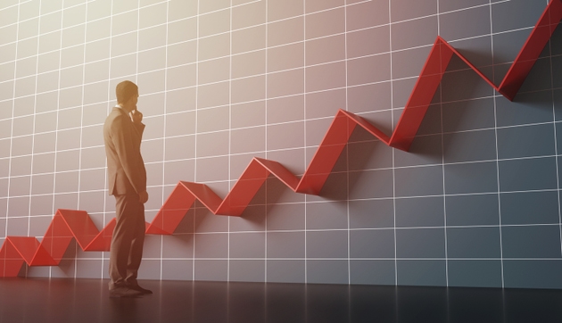 Businessman analyzing sales graph