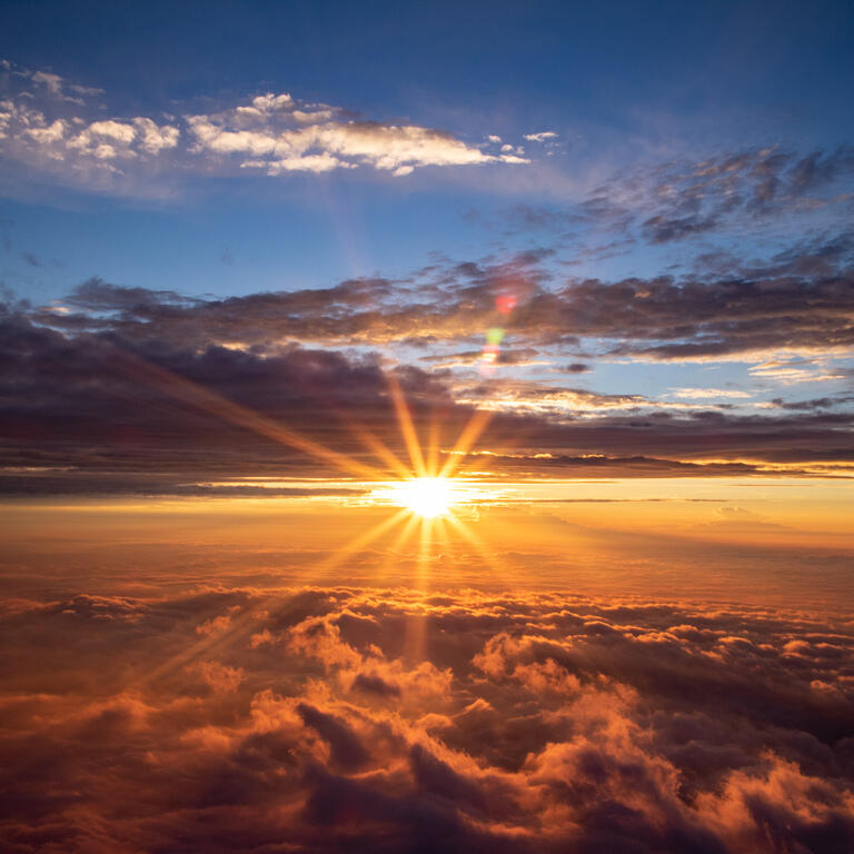 The sunrise over the sea of clouds