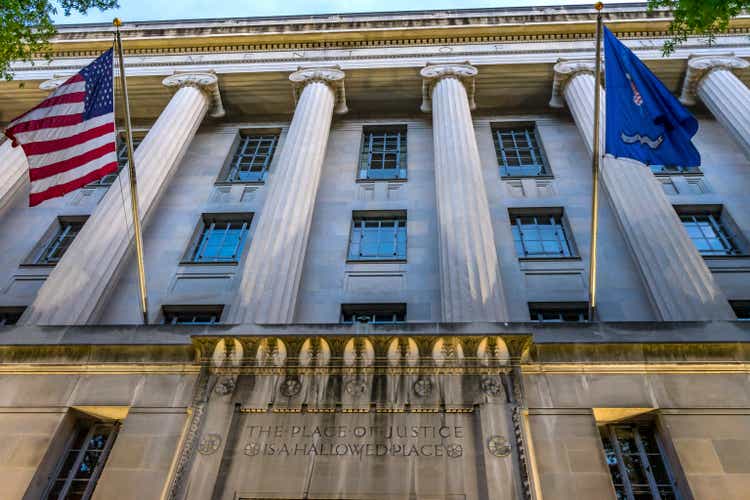 Flag on the facade of the Robert F. Kennedy Department of Justice Building in Washington, DC