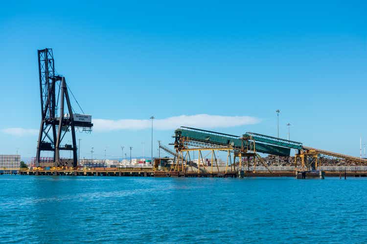 Pier crane and bulk loading conveyor facilities of a steel manufacturing and scrap metal recycling Schnitzer Steel Industries company at the Port Of Oakland