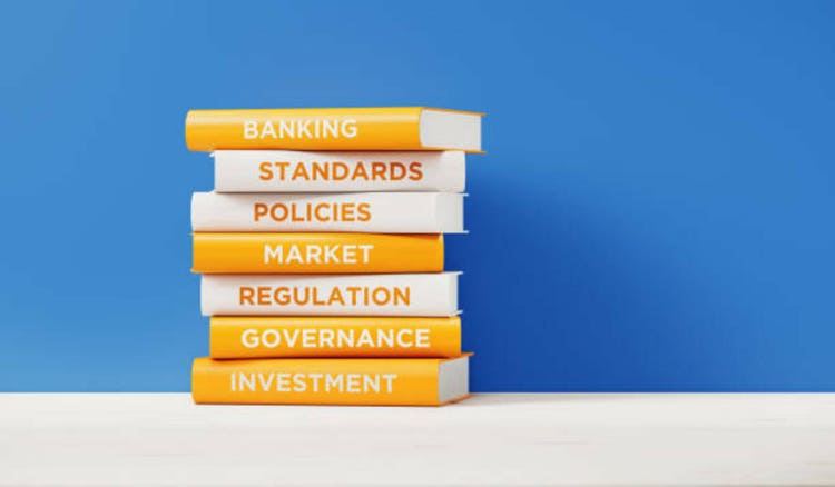 Books of Banking And Investment In Front Grey Wall