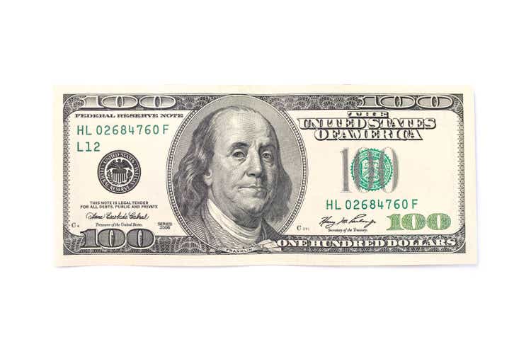 One hundred dollars isolated on white background.