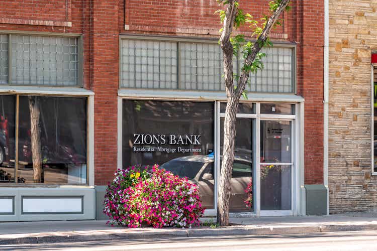 Utah city street with Zions Bank in town near Dinosaur National Monument in summer
