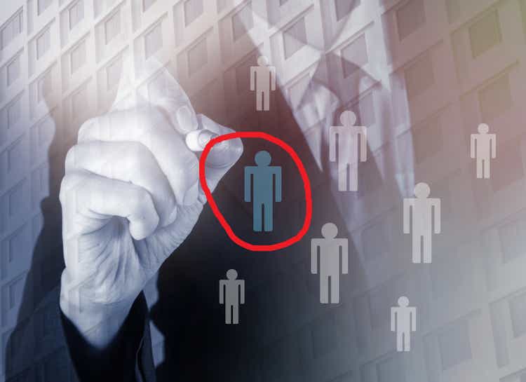Businessman drawing circle around man icon;Recruitment,Human resources concept