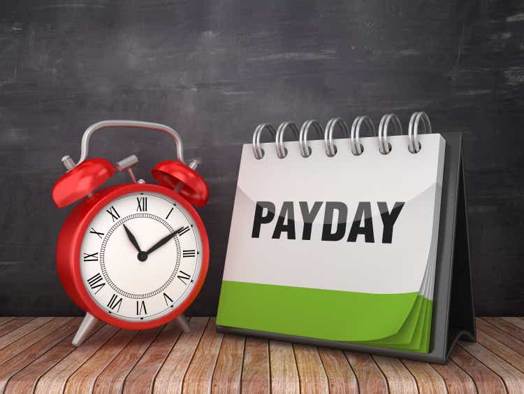 PAYDAY Diary with Alarm Clock on Blackboard Background - 3D Rendering