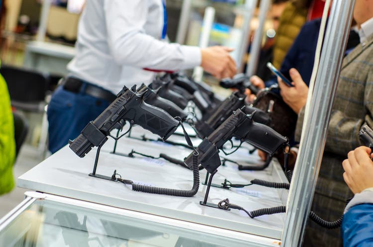 Gun Display Stands. Pistols for sale in the store.