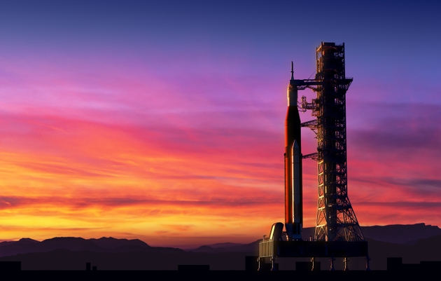 Space Launch System On Launchpad Over Background Of Pink Clouds