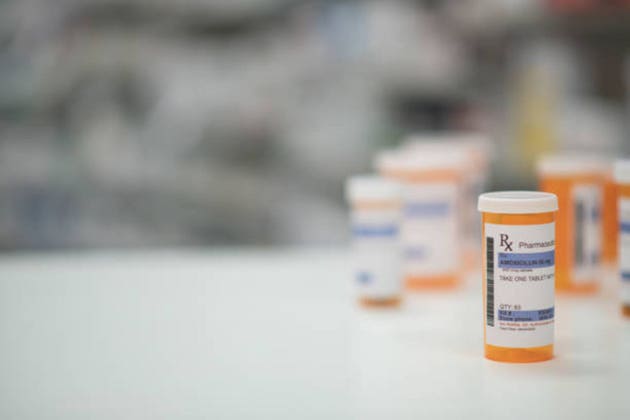 Different Sizes of Empty Prescription Bottles stock photo