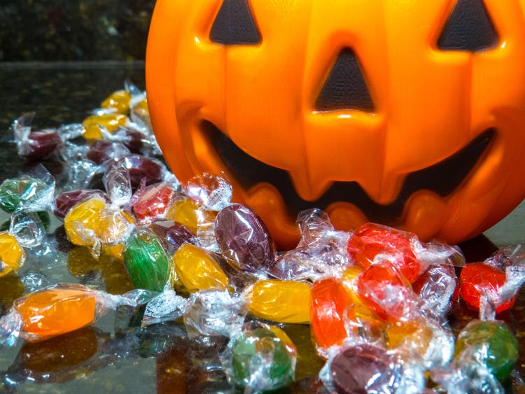 Halloween pumpkin and candies