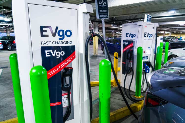 EVgo charging station with Tesla Connect adapter in use