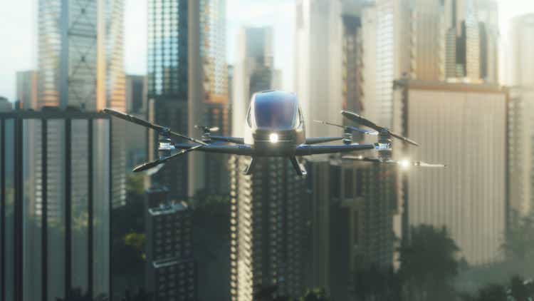 An unmanned passenger drone has flown in to pick up its passenger on a cloudy day. Unmanned air taxi. 3D Rendering