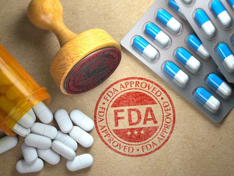 FDA approved design. Rubber stamp with FDA and pills on kraft paper.