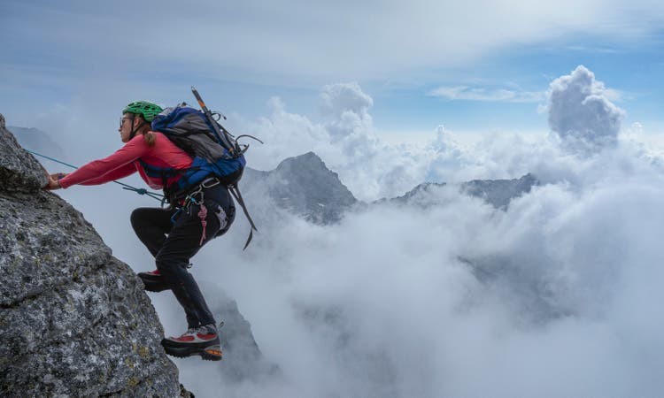 Female climber on a rocky wall