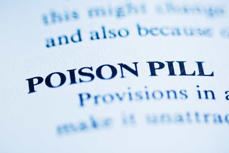 The business term "Poison Pill" defined in dictionary or encyclopaedia