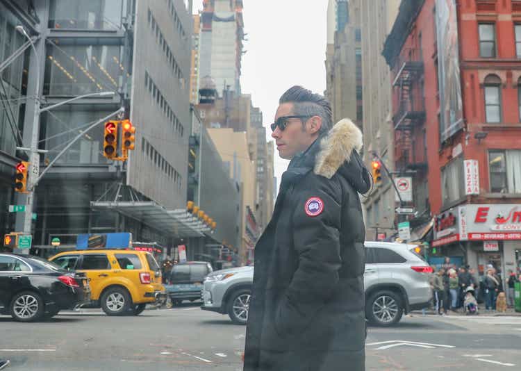 Man with Canada Goose black jacket in New York