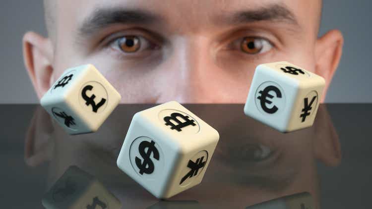Currency trader uses dice to find out what to buy.