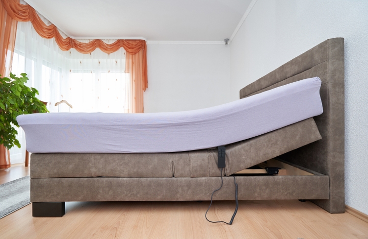 Bed with tilt adjustment mattress bed in the bedroom of the house, comfortable mattress and sleep