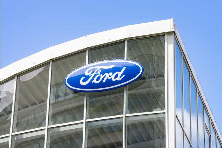 Logo of Ford at a car dealership