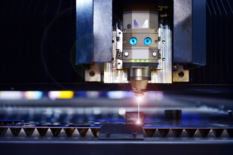 Industrial laser cut machine while cutting the sheet metal industrial