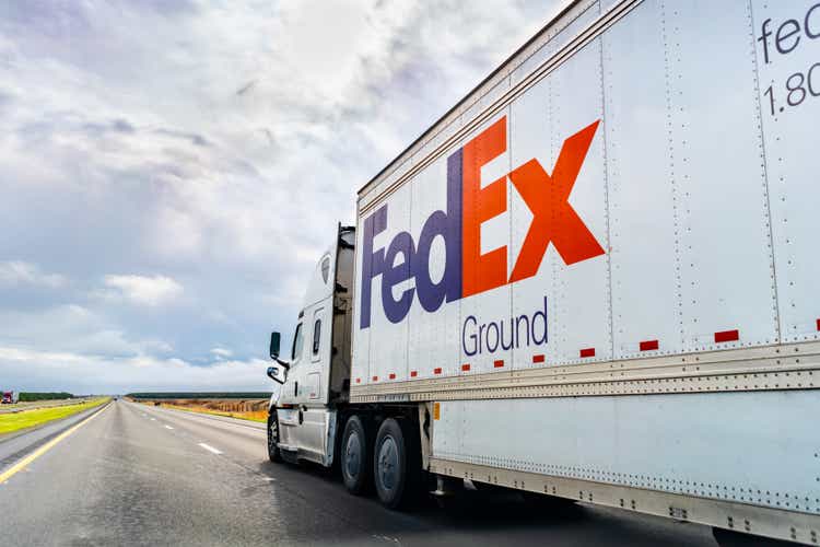 FedEx Ground truck driving on the interstate