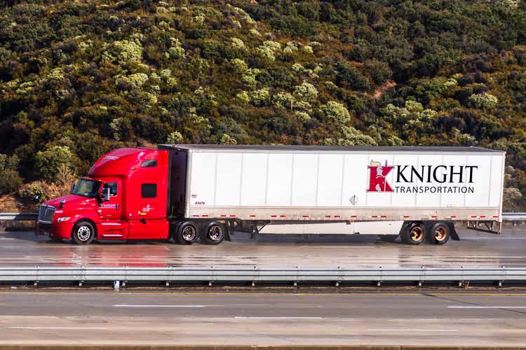 Knight Transportation truck driving on the freeway