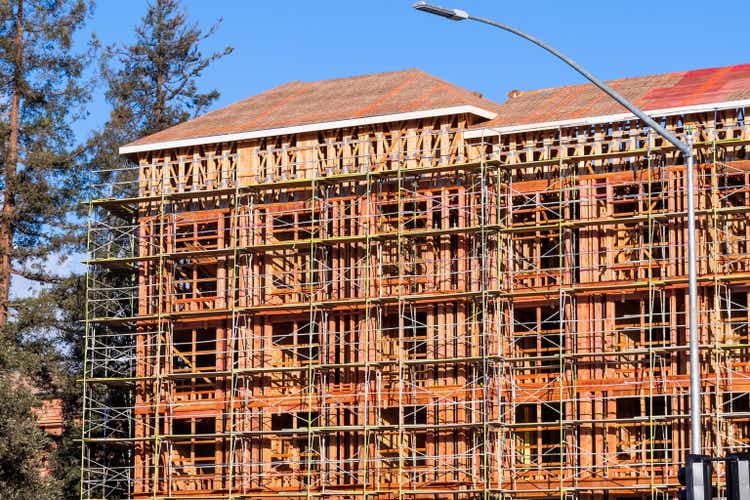 Multifamily residential building under construction in Santa Clara; the entire Silicon Valley and San Francisco Bay Area has faced a housing crisis, with increased housing costs, for several years