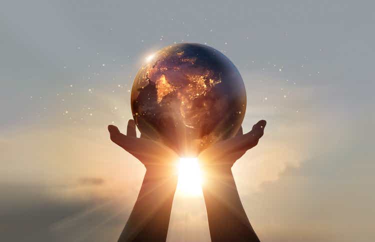 Earth at night was holding in human hands. Earth day. Energy saving concept, Elements of this image furnished by NASA