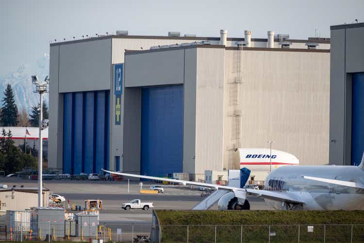 Planes outside a hanger at the Boeing Plant including a Dreamliner